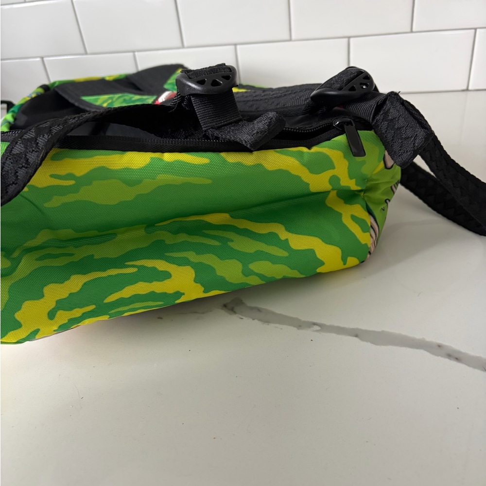 Sprayground Green and Yellow Camouflage Backpack ren and stimpy. Brand new